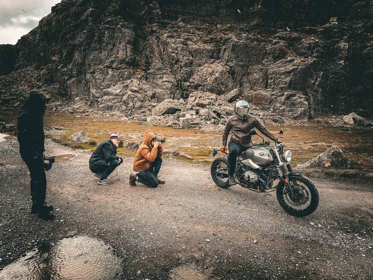 James Camp on set, motorcycle campaign BTS