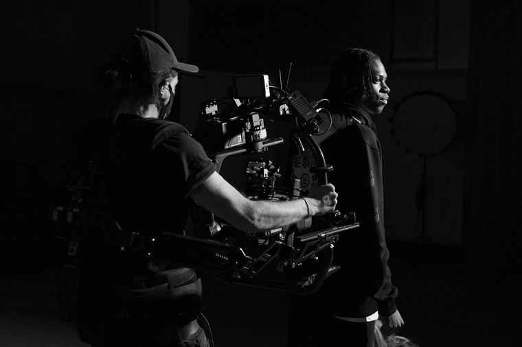 James Camp operating a gimbal on set